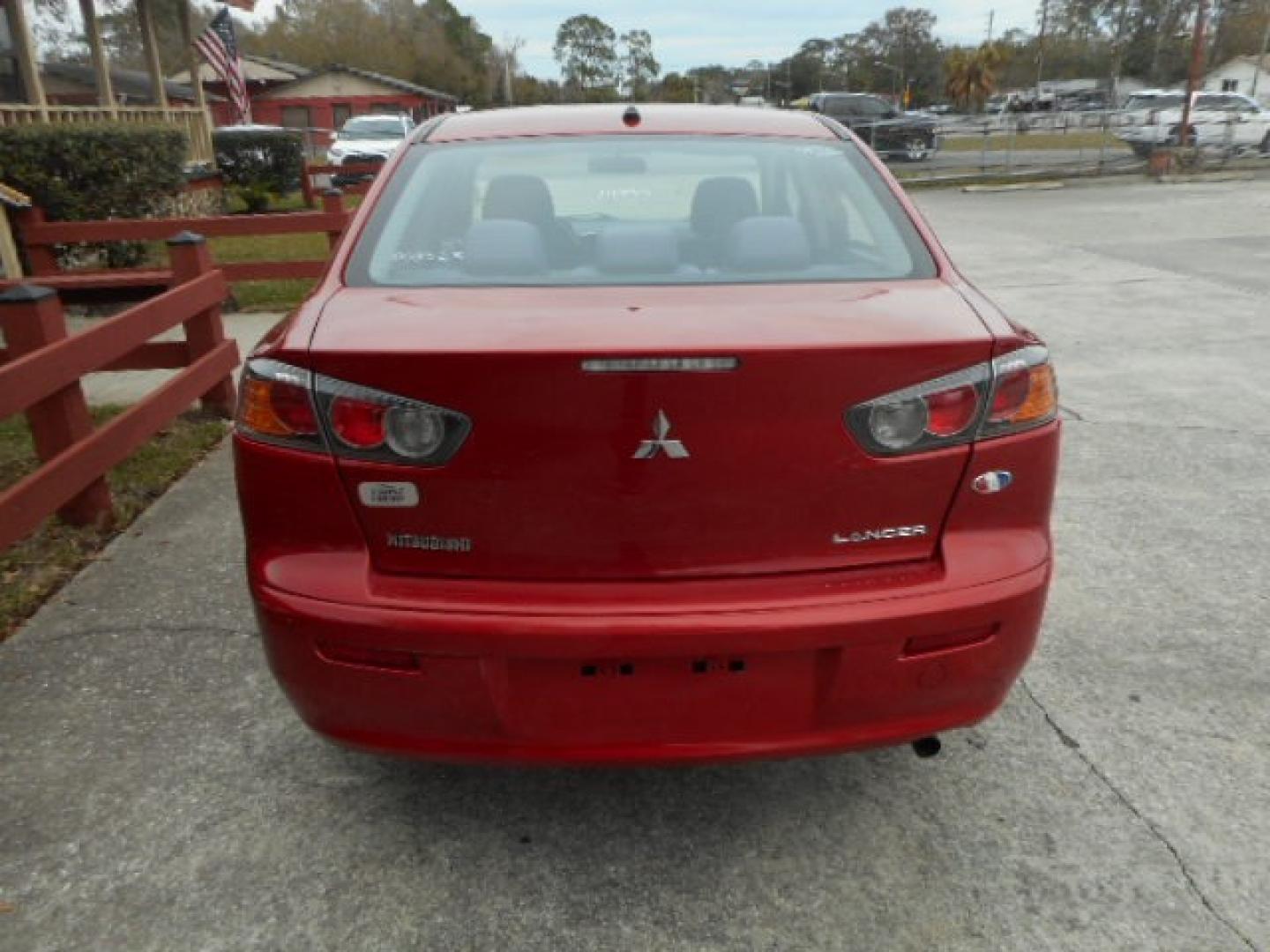 2014 RED MITSUBISHI LANCER (JA32U2FU2EU) , located at 390 Hansen Avenue, Orange Park, FL, 32065, (904) 276-7933, 30.130497, -81.787529 - Photo#5